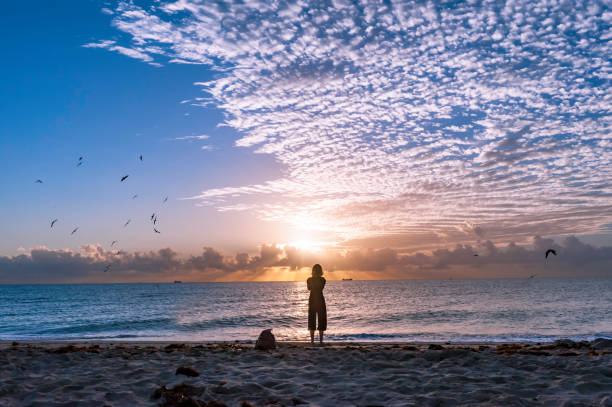 istock Yoga Woman on Miami Beach 855220796