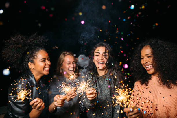 istock Happy women at night 855224394