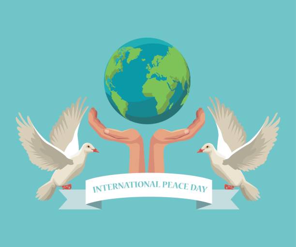 istock color poster hands holding a earth world with pair pigeons flying with ribbon international peace day 855224892