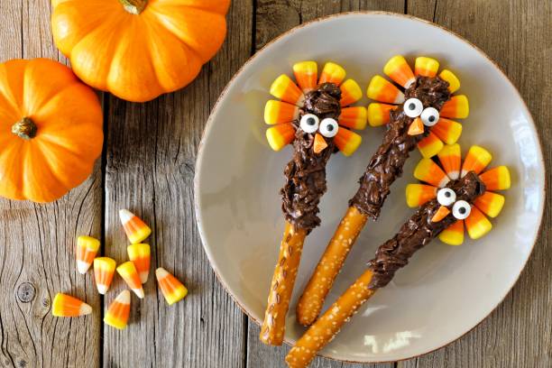 istock Thanksgiving turkey pretzel sticks, overhead on wood 855242366