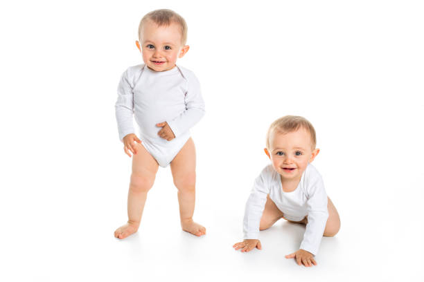 istock Two identical twins on a white isolated background 855243102