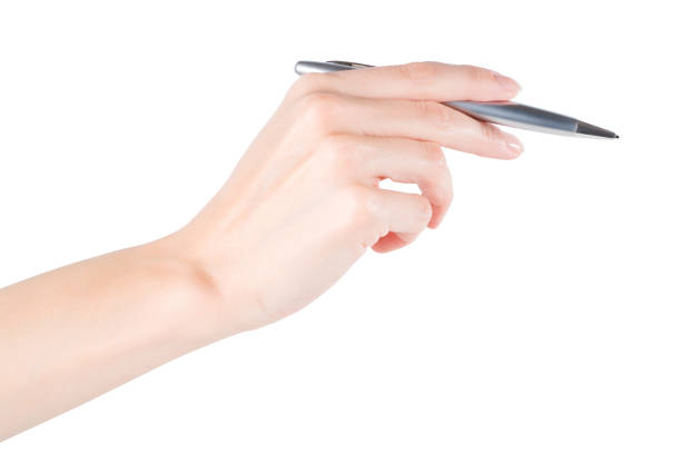 istock Woman hand holding pen, isolated with clipping path 855247260