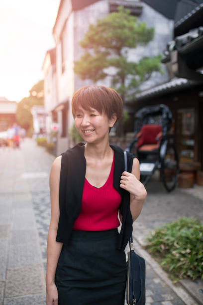 istock Young woman walking in old town Kawagoe 855252514