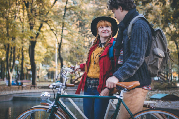 istock Young cheerful couple at autumn walk 855253316
