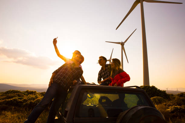istock young people who enjoy selfie during the sunset 855255748