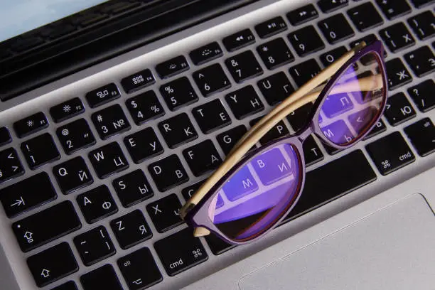 Safety glasses on the keyboard.