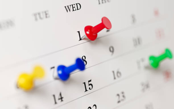 istock White Calendar With Colored Push Pins Showing Important Dates 855263558