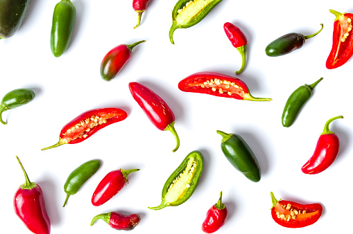 Colorful jalapenos peppers on white background isolated