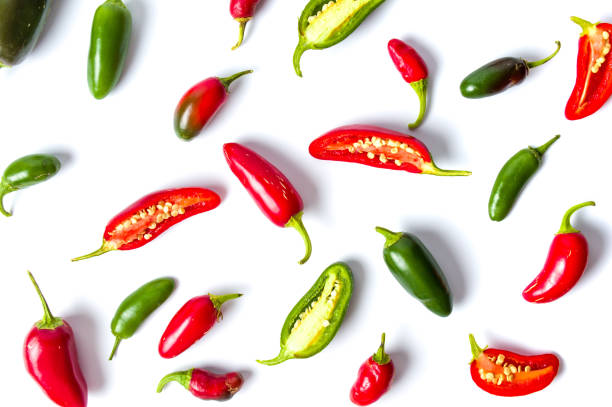 Colorful jalapenos peppers on white background Colorful jalapenos peppers on white background isolated cayenne powder photos stock pictures, royalty-free photos & images