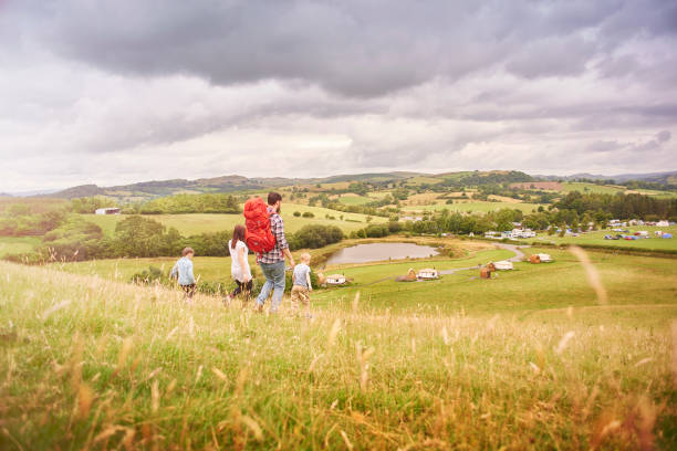 istock young family hill walking 855265968