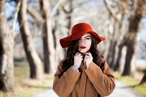 Woman in the autumn fores