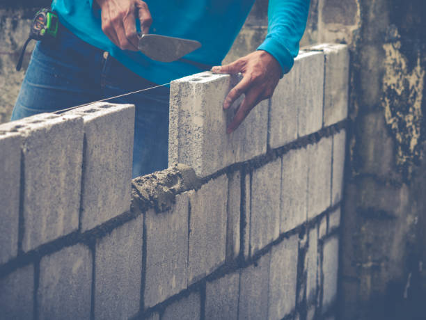 istock Brick Builders Are Building Walls 855288124