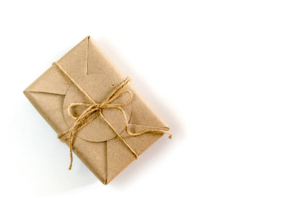 istock Gift box wrapped in kraft paper and rustic hemp as natural rustic style 855291780