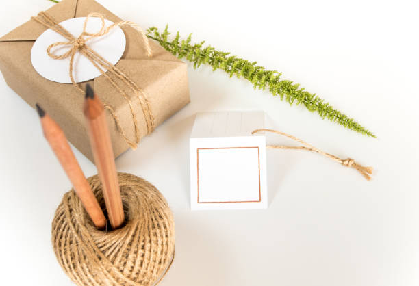 istock Gift box wrapped in kraft paper and rustic hemp as natural rustic style 855291784