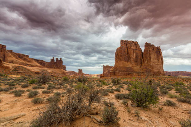 istock Dramatic storm clouds in the Utah desert, Arches National Park, in autumn 855291800