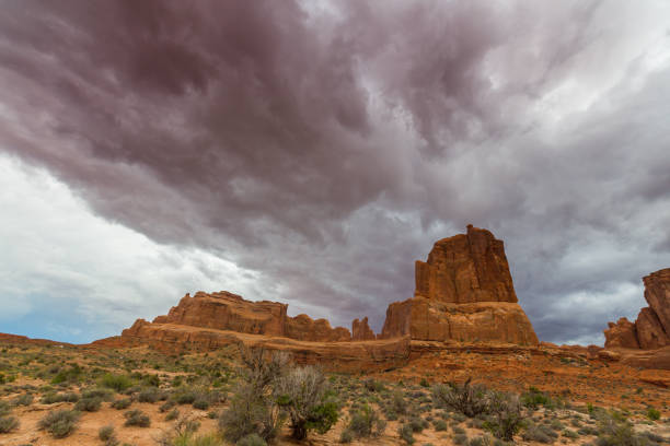 istock Dramatic storm clouds in the Utah desert, Arches National Park, in autumn 855291890
