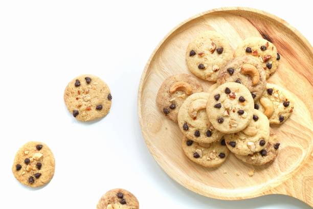 istock Top view, cookies on wooden plate 855297982