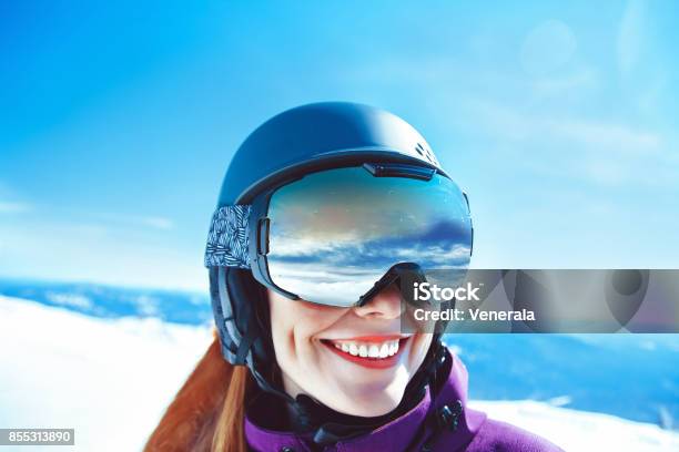 Woman In Mountain Goggles Stock Photo - Download Image Now - Ski Goggles, Skiing, Women