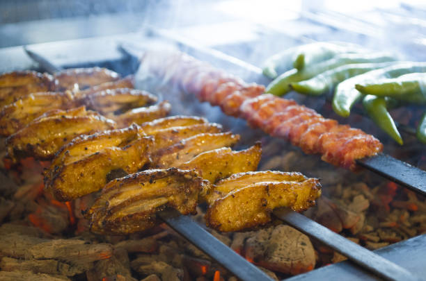 chicken wings and kebab on the grill