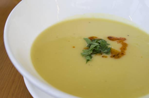 istock lentil soup private dining table and stirring the soup 855318788