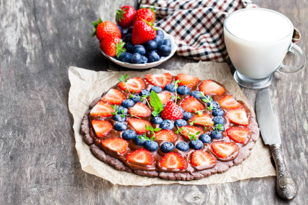 istock Homemade  chocolate natural fruit pizza with berries 855322456