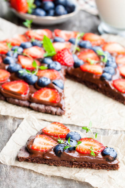 istock Homemade  chocolate natural fruit pizza with berries 855325594