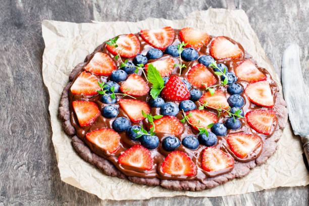 istock Homemade  chocolate natural fruit pizza with berries 855326034