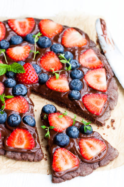 istock Homemade  chocolate natural fruit pizza with berries 855326352