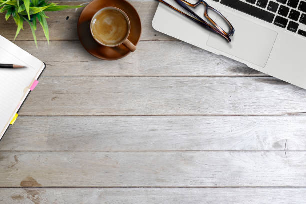 istock White office desk table with a lot of things on it. Top view with copy space. 855330448