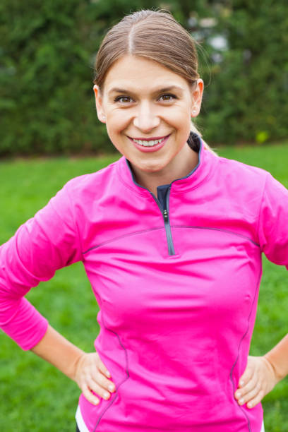 istock Attractive female with pink sportswear 855330876