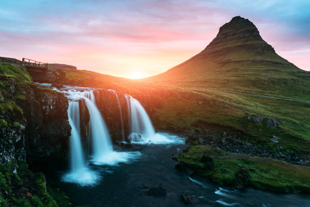 istock Colorful sunrise on Kirkjufellsfoss waterfall 855341750