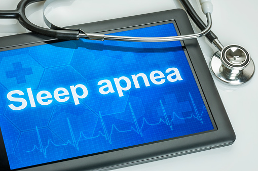 Tablet with the diagnosis Sleep apnea on the display