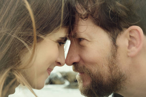 istock Happy couple nose to nose looking each other 855342508