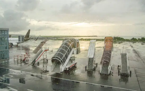rainy airport scenery at evening time in Denpasar, the capital of a island named Bali in Indonesia