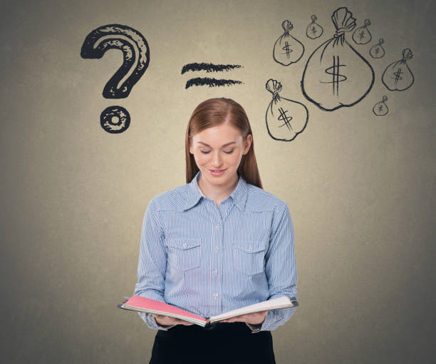 istock Businesswoman reading her diary 855349844