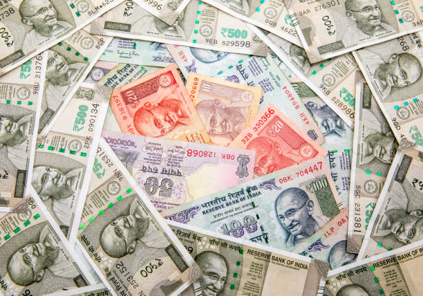 istock Indian rupee banknote cash background 855352580