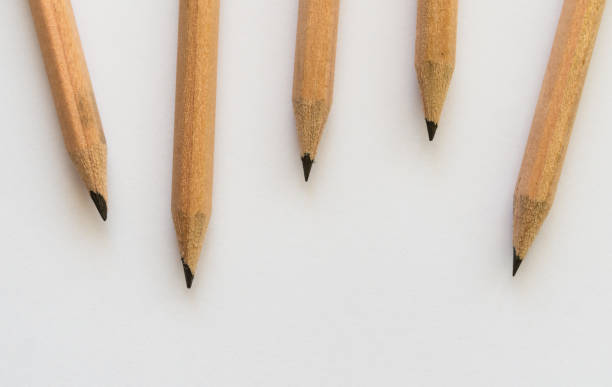 istock sharpen brown pencils on white background 855353036