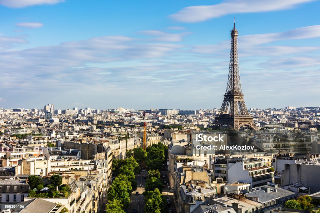 Paris cityscape with Eiffel Tower. Paris, France Paris cityscape with Eiffel Tower from the top of Triumphal Arch of the Star (Arc de Triomphe de l'Etoile) at the summer sunset. Paris, France "n Paris - France Stock Photo