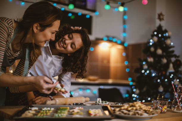 istock Mother and daughter making Gingerbread cookies for Christmas 855364970
