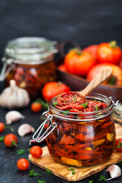 istock Sun dried tomatoes with garlic and olive oil 855382514