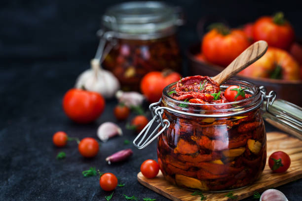 istock Sun dried tomatoes with garlic and olive oil 855382556