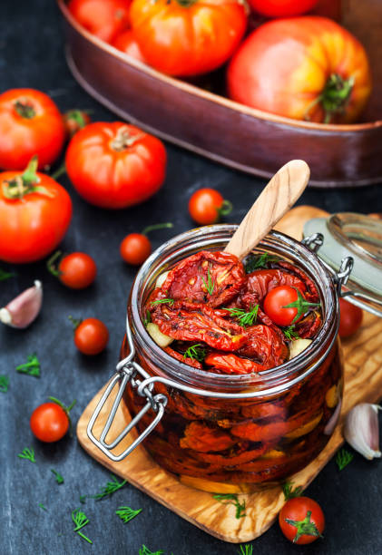 istock Sun dried tomatoes with garlic and olive oil 855382692
