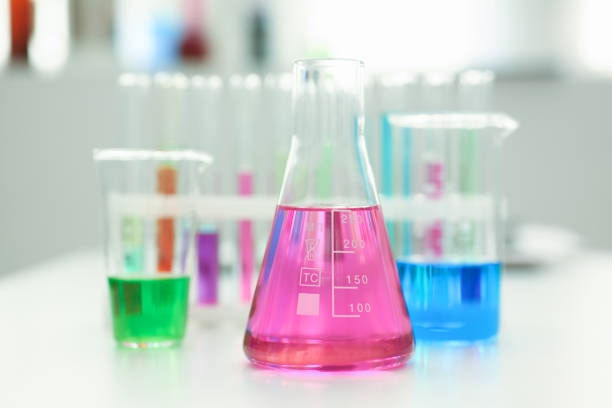 istock Chemical industry bulb with blue magenta pink liquid 855382804