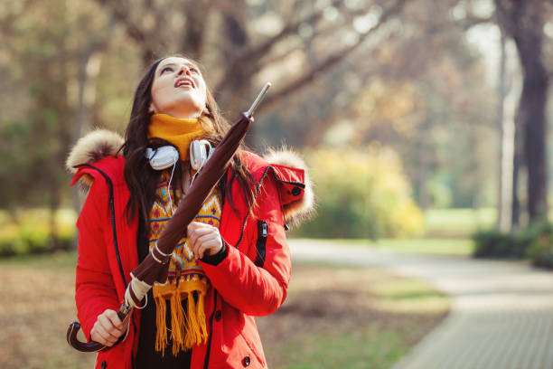 istock Beautiful Woman Enjoying Autumn 855386064