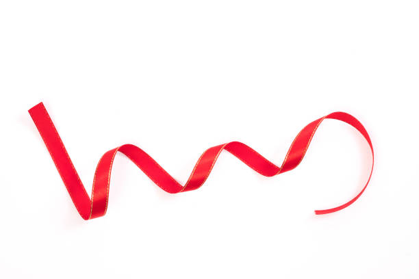 istock Beautiful red ribbon twist spiral isolated on white background. 855391246