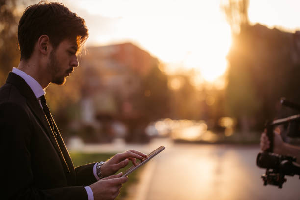 istock Young businessman with digital tablet 855398132