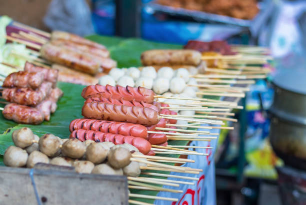 istock Sausage fried on a stick,Thai fast food 855402080