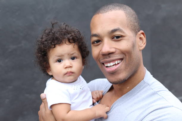 istock Young father and his little girl hugging 855402124