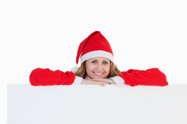 istock Cute blondhaired woman dressed as Santa Claus 855413050