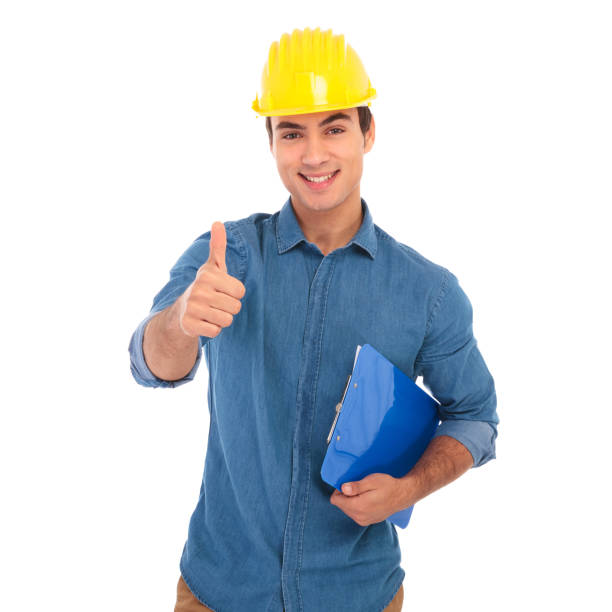 smiling young construcion engineer making the ok sign smiling young construcion engineer making the ok thumbs up hand sign on white background man laughing hard stock pictures, royalty-free photos & images